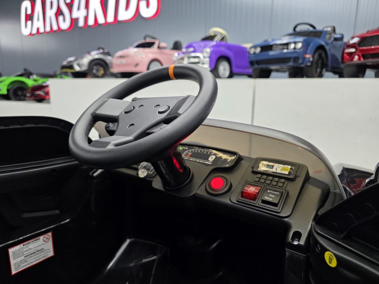 McLaren Rally 12V ride-on car rear view with rally styling