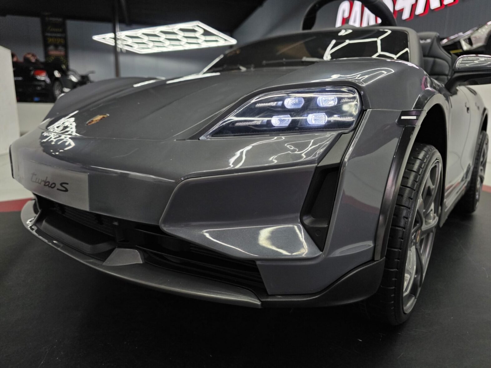 Kids Porsche Taycan electric car with working LED lights