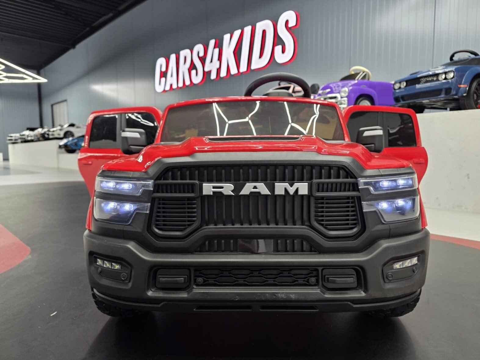 Dodge RAM electric truck for kids front view showing LED lights