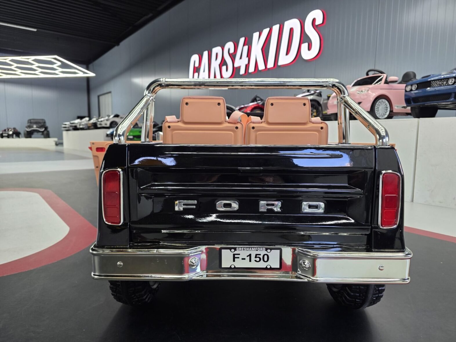 Ford F-150 24V ride-on truck side profile view