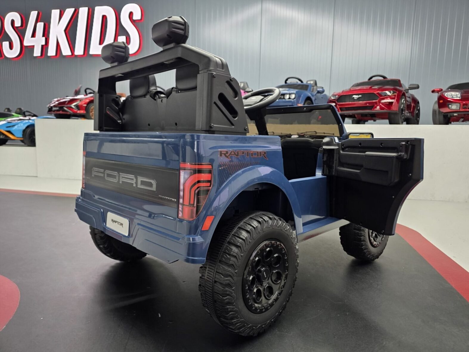 Ford Raptor kids electric car rear view showing dual seating