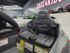 Child driving grey Porsche Taycan 12V electric ride-on car