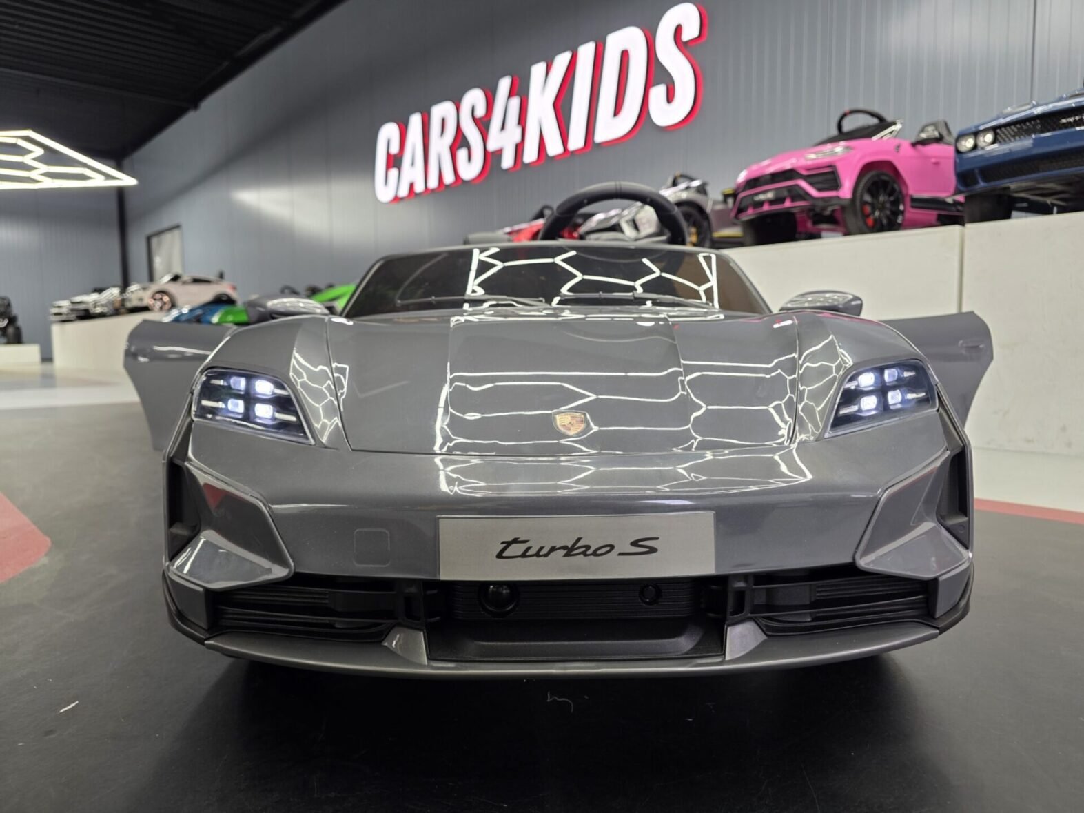 Porsche Taycan 2 seater kids ride-on car side angle
