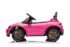 Pink Porsche Taycan children's ride-on car side profile view