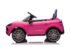 Pink Porsche Cayenne ride-on car interior with leather seat and dashboard