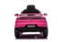 Child driving pink Porsche Cayenne 12V electric ride-on car