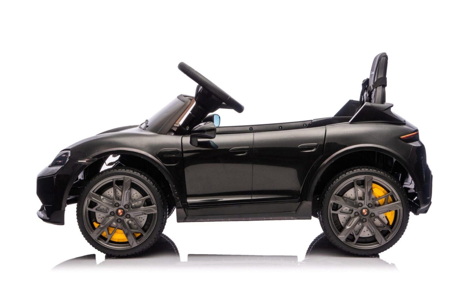 Porsche Taycan kids car interior with leather seat and dashboard